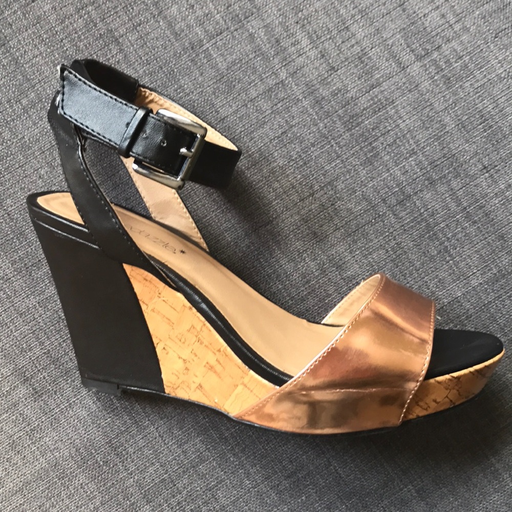 Gold and black platform heel